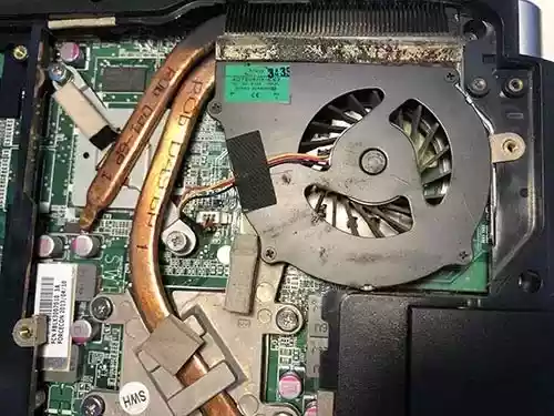 Why is my laptop blowing hot air?